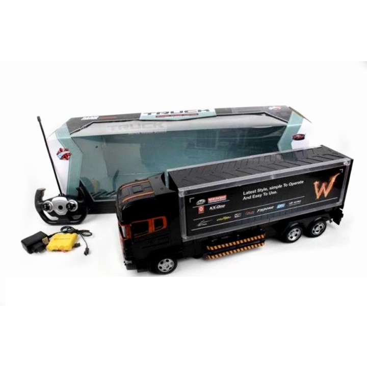 Тягач р/у на аккум с заряд уст-вом, движ. во всех направ. свет. эффек в/к 60,5*17*21 см. арт.1710585