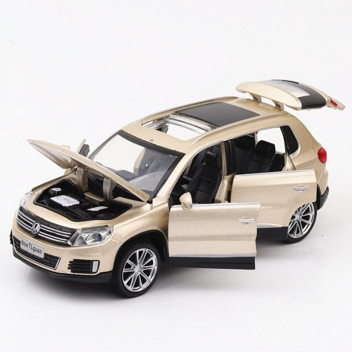 Модель мет. "Volkswagen Tiguan" 1:32 инерц. свет, звук,открыв двери баг. и капот арт.53146/71361